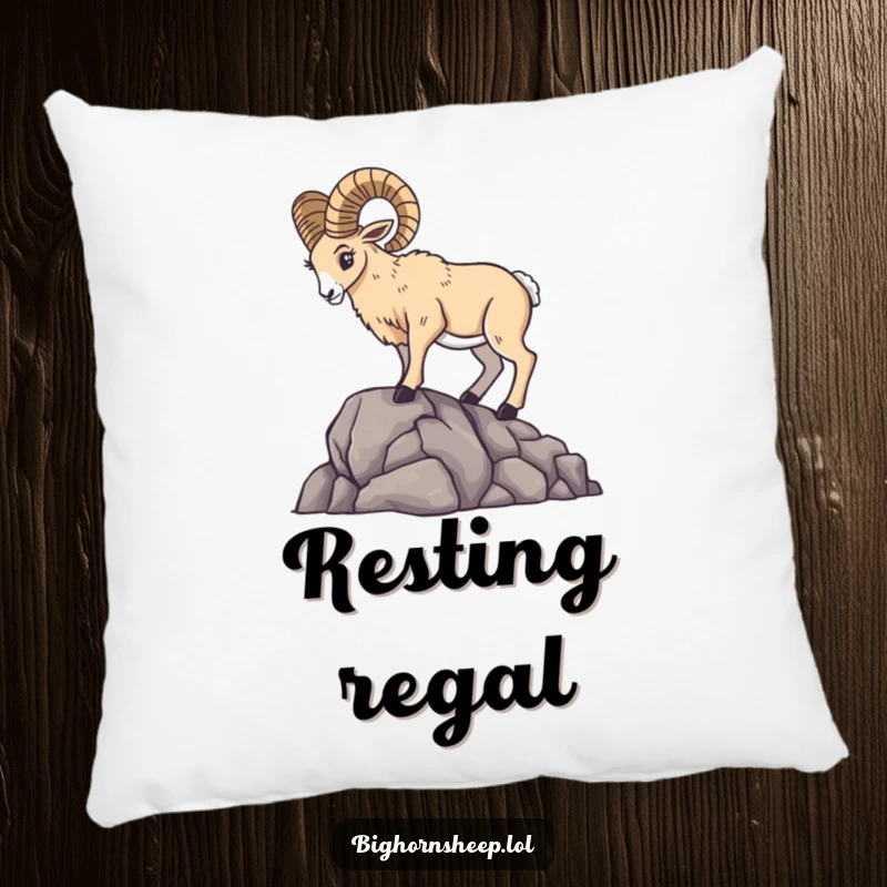 Majestic bighorn sheep striking a dramatic pose on a rocky outcrop, detailed on a soft throw pillow.