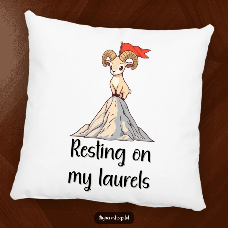 Funny pillow featuring a bighorn sheep standing triumphantly on a mountain peak with a flag, offering hilarious comfort and pride.