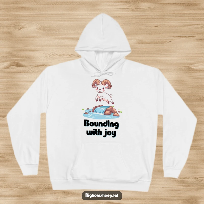 Funny happy bighorn sheep in a joyful leap over a water stream on a warm hoodie. Cheerful desert animal apparel.