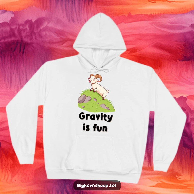 Funny bighorn sheep sliding down a grassy slope with a joyful yell, captured on a warm, cozy hoodie.