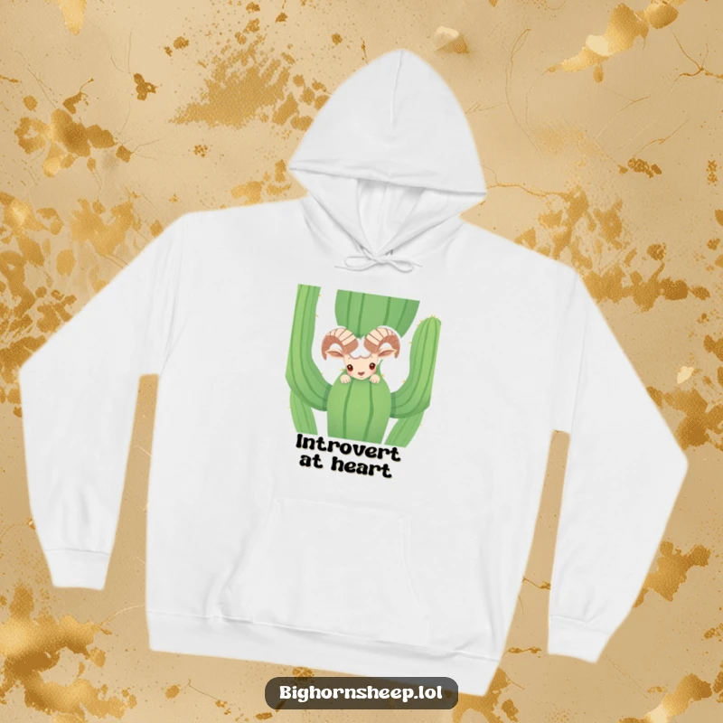 Funny shy bighorn sheep peeking curiously from behind a tall cactus on a warm hoodie. Humorous desert creature graphic.