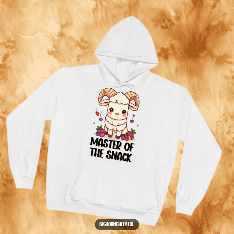 Funny bighorn sheep hoodie showing a playful sheep skillfully juggling berries with a mischievous expression, perfect for cozy laughs.