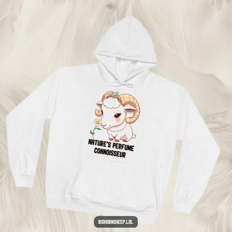 Funny bighorn sheep hoodie, a sheep with a jeweled headband curiously sniffing a flower, offering cozy comfort and gentle humor.